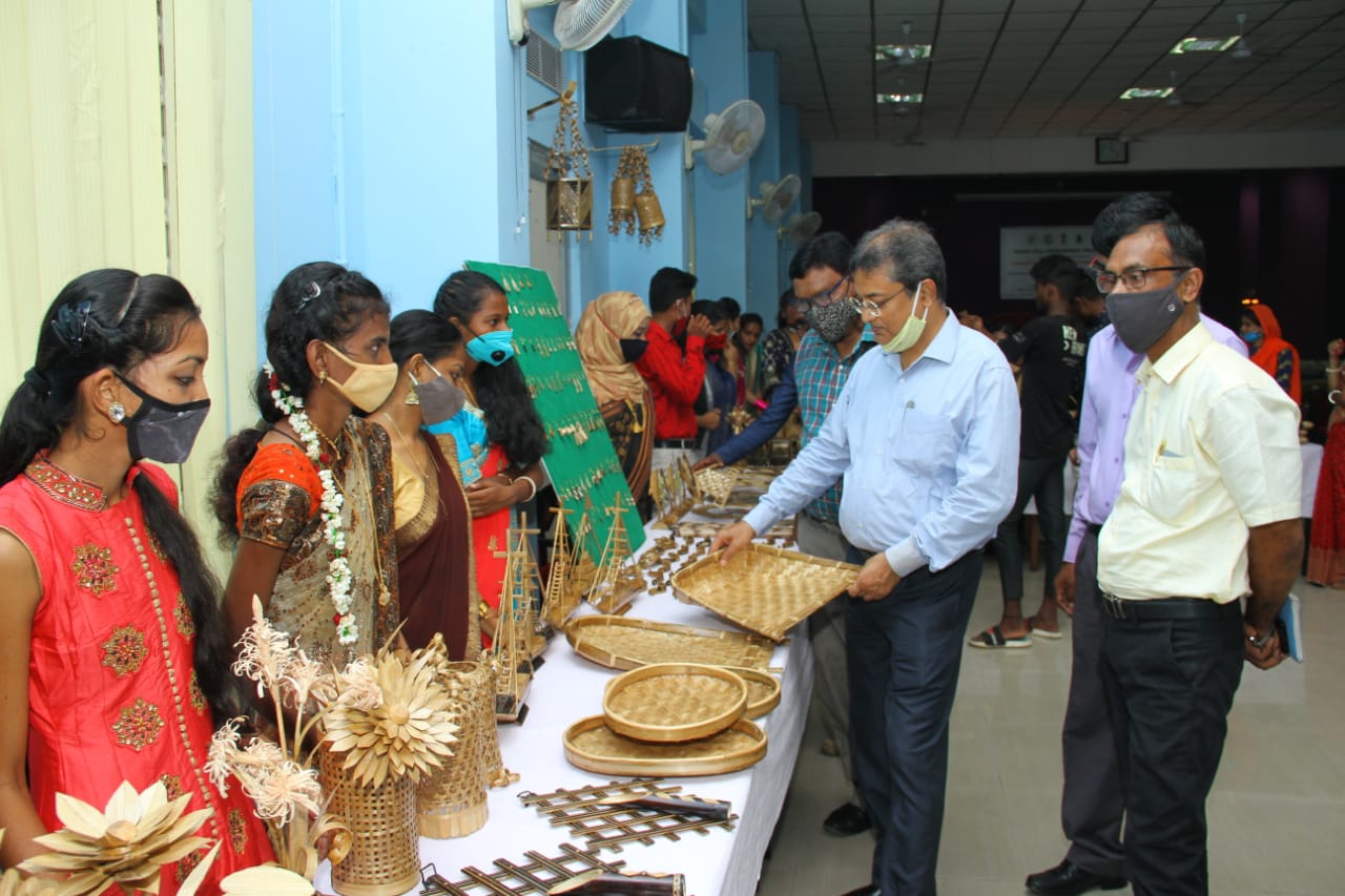 Chief Guests are viewing the bamboo products made by the trainees